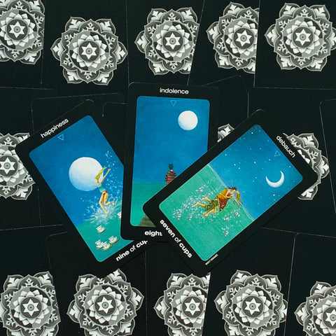Sun And Moon Tarot cards in a tin US Games Systems