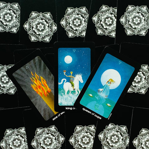 Sun And Moon Tarot cards in a tin US Games Systems
