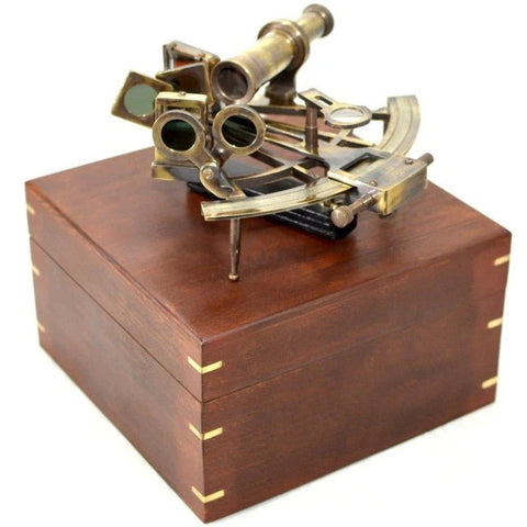 Brass sextant in a wooden box NC1517